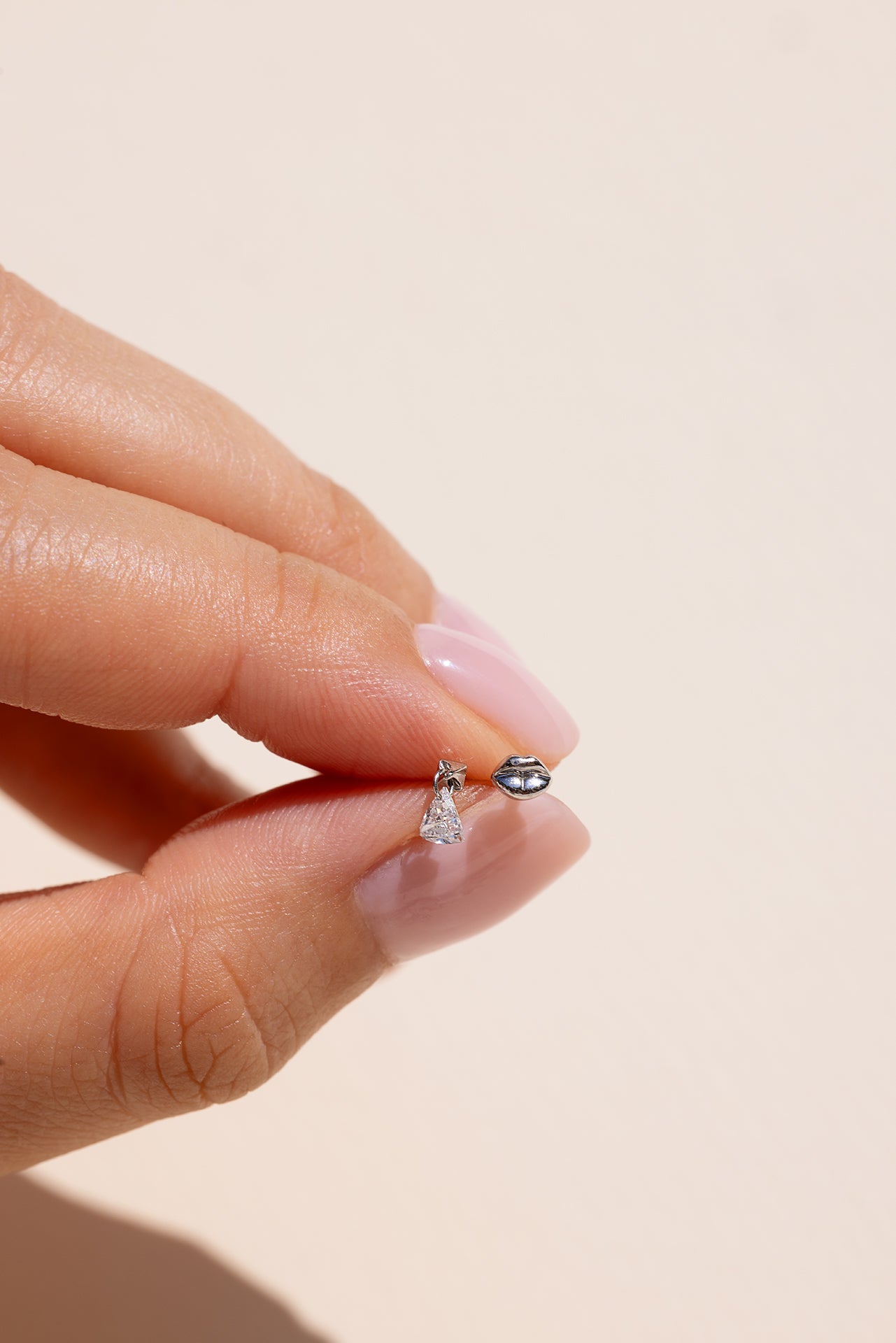 18k white gold trillion diamond dangle post stud with lip motif flat back
