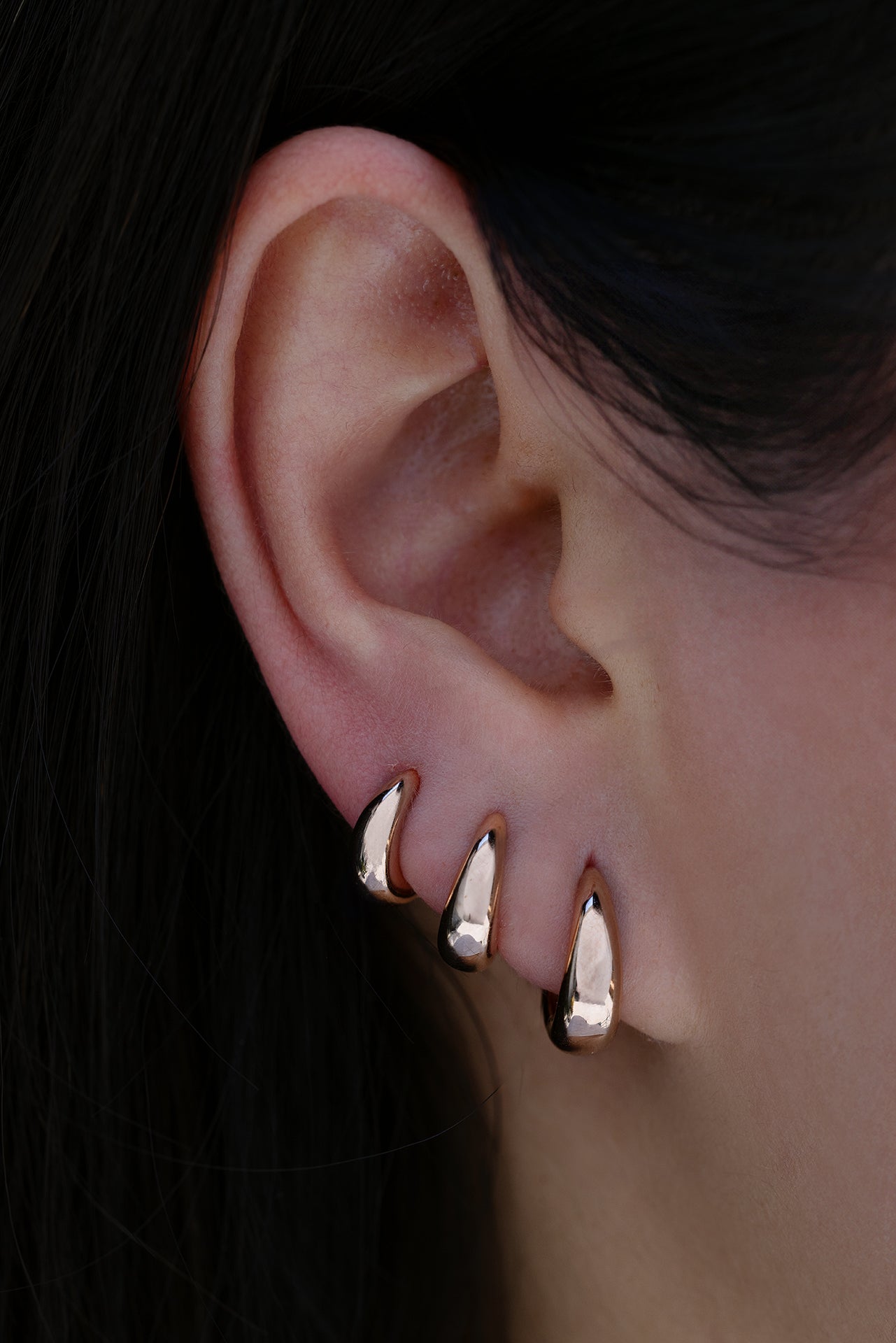 18k rose gold signature tapered hoops in size 9.5mm, 8mm, 6.5mm
