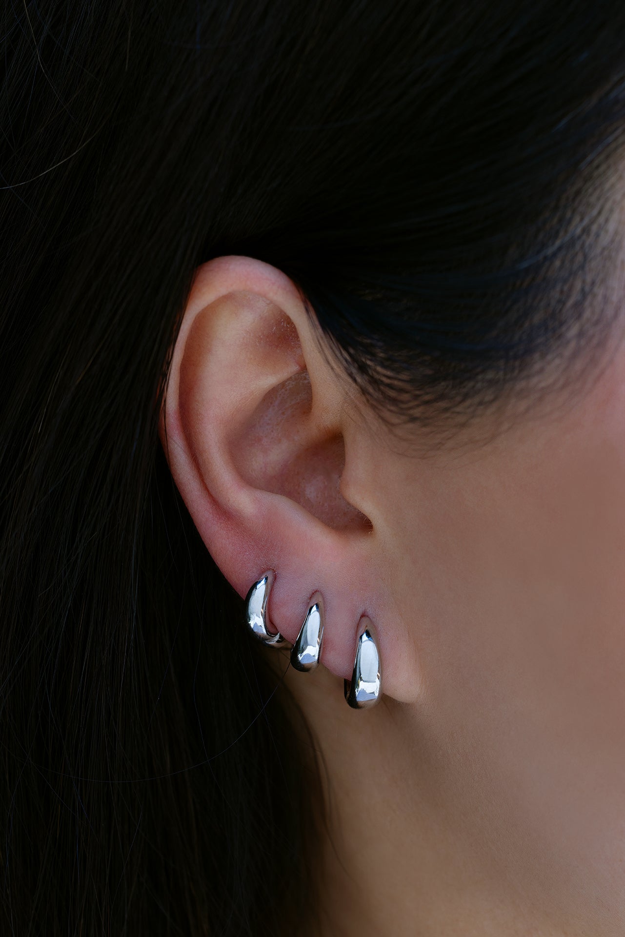 18k white gold signature tapered hoop in size 9.5mm, 8mm, 6.5mm