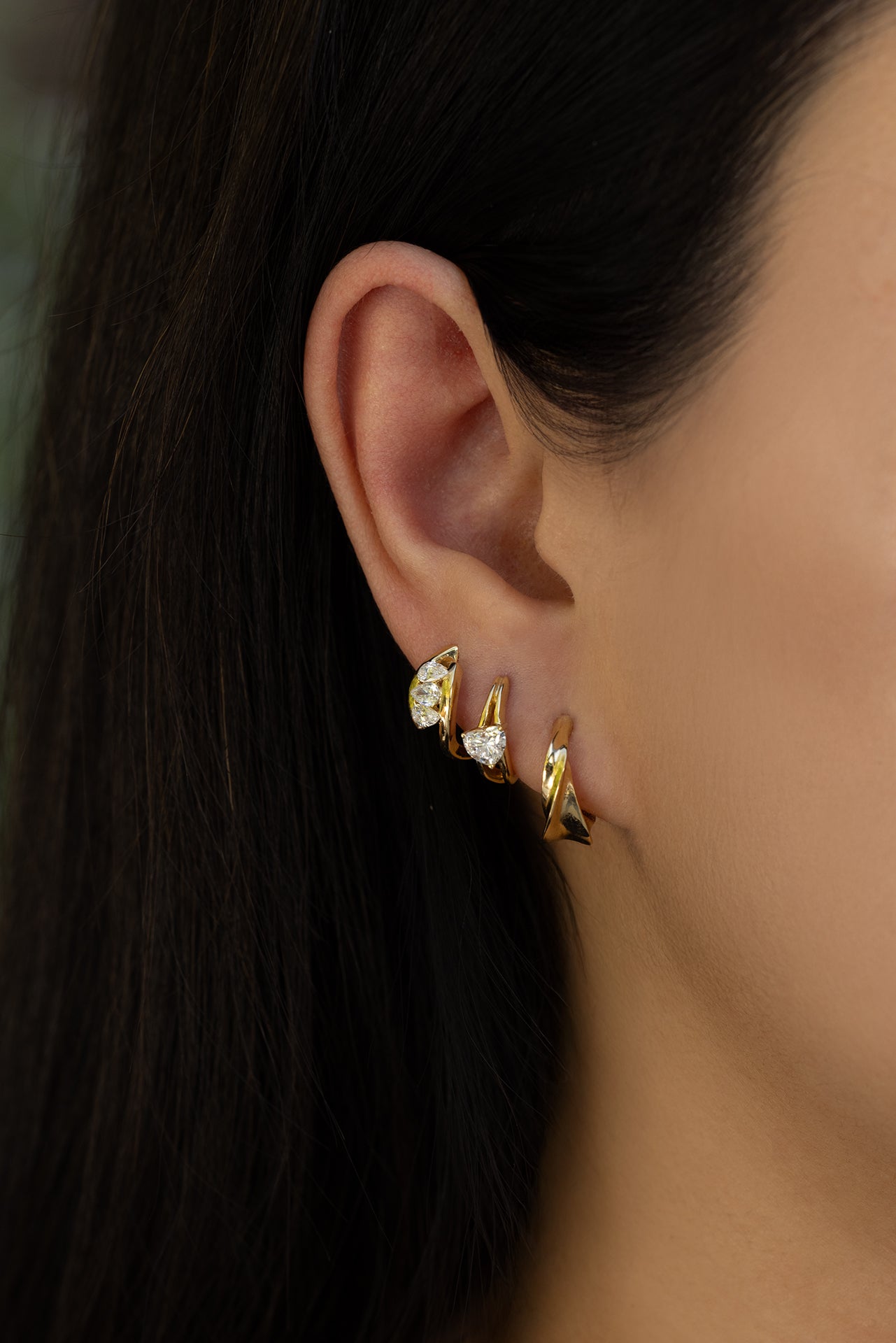 18k yellow gold 9.5mm swirl tapered hoop,  18k yellow gold 9.5mm diagonal heart diamond hoop, 18k yellow gold 9.5mm pear diamond triplet hoop